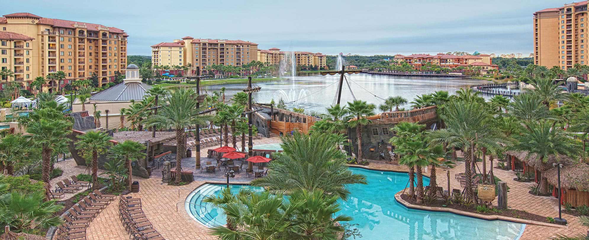  The lakefront pool and pirate shipwreck play area at Club Wyndham Bonnet Creek resort in Orlando, Florida 