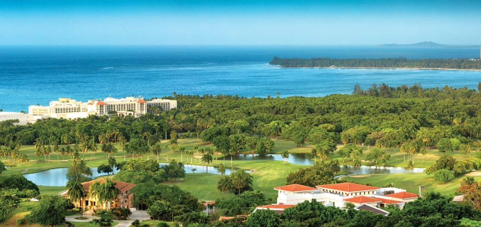 Birds-eye-view of golf course and ocean near Margaritaville Vacation Club by Wyndham - Rio Mar