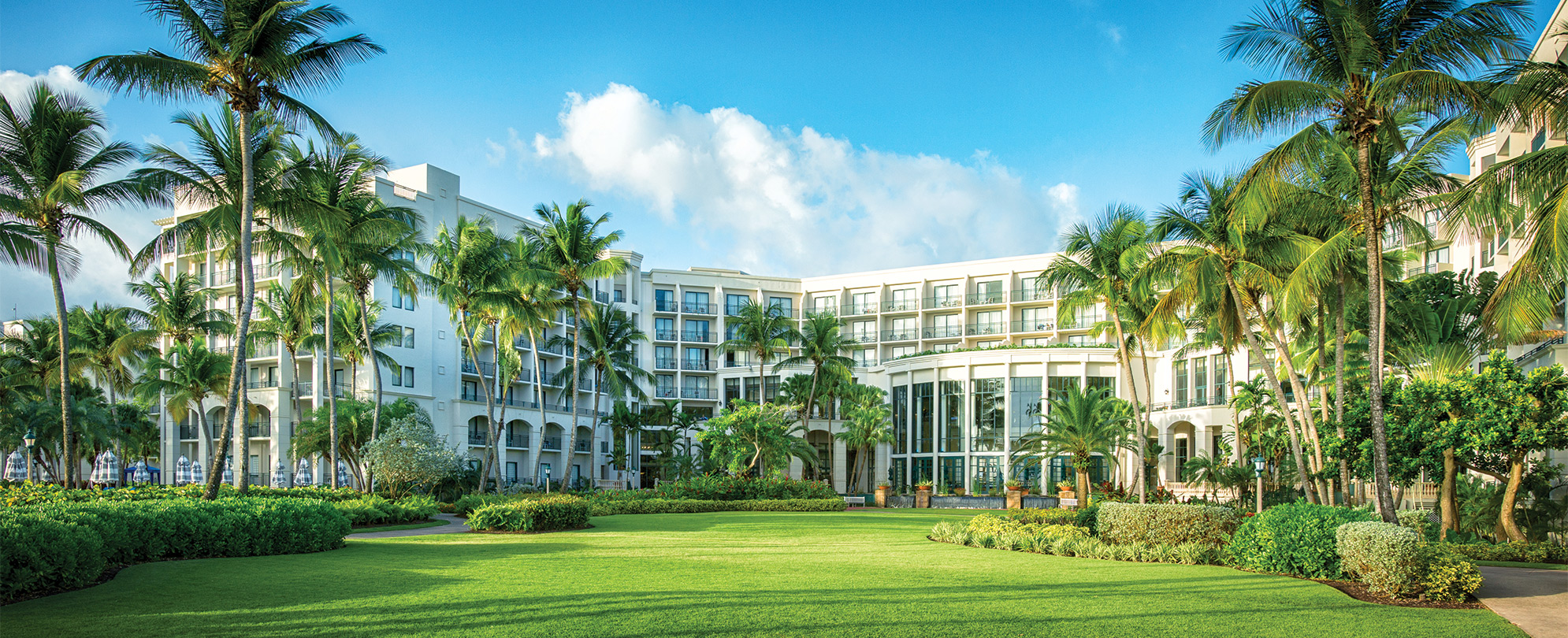 The exterior of Margaritaville Vacation Club by Wyndham - Rio Mar, a tropical and oceanfront timeshare resort.